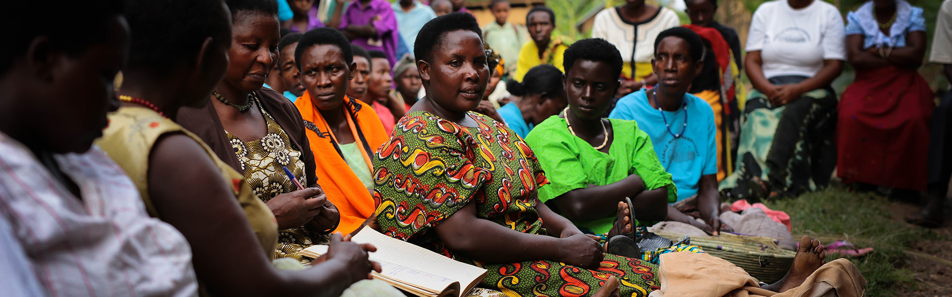 Women sitting together in a savings group.
